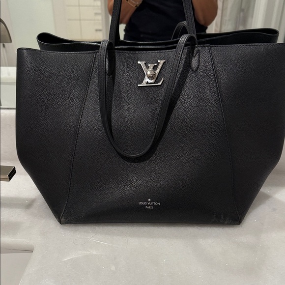 Louis Vuitton Elegant Black Tote with Silver Logo - Picture 1 of 7